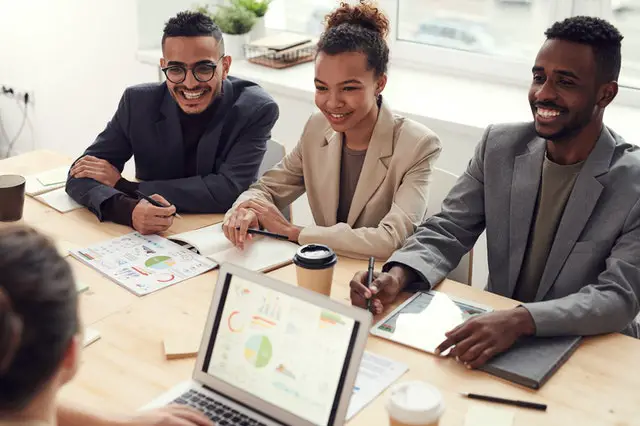 employees in a green office