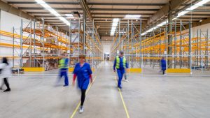 Large warehouse with employees