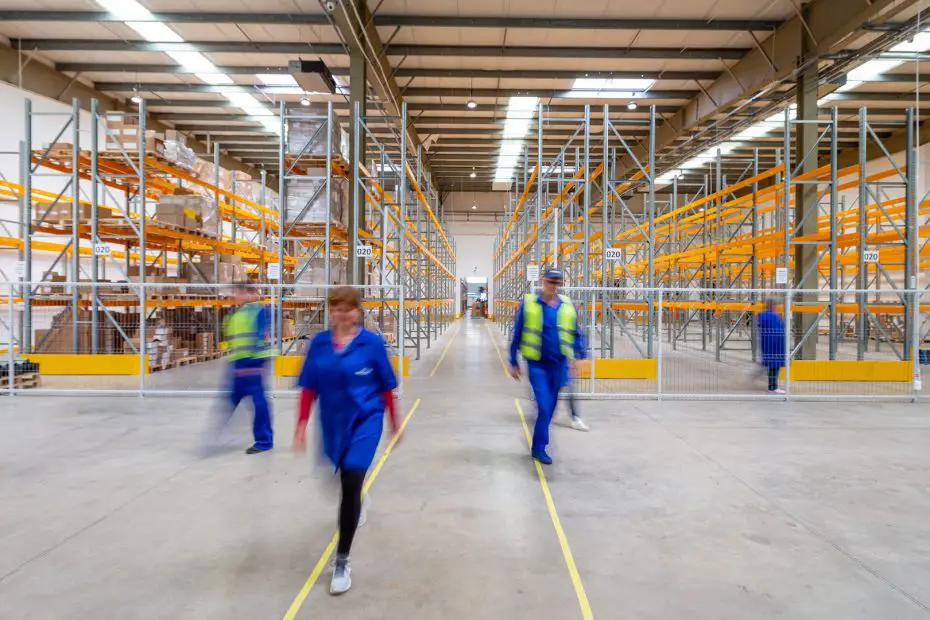 Large warehouse with employees